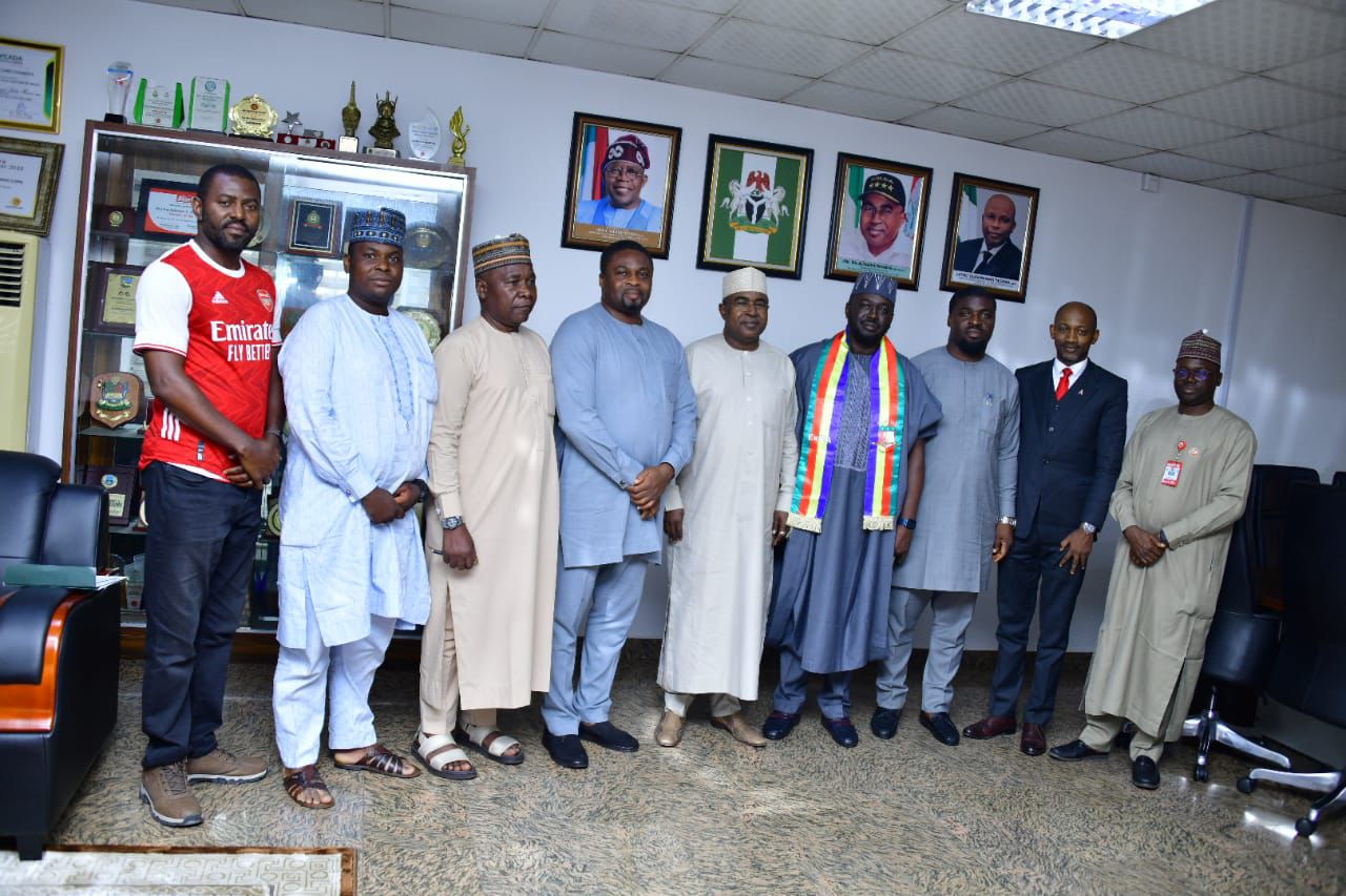 Brig Gen Marwa (rtd), middle, flanked by representatives of the NMS Ex-Boys Association during the visit