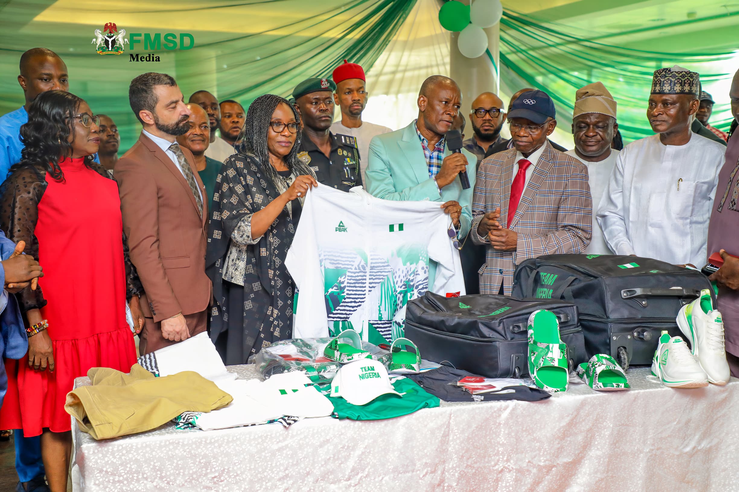 Sports Minister Charges Team Nigeria to Fly High at Olympics, Officially Hands Over Team Nigeria Contingent to the NOC and NPC